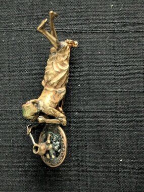 Vintage  Girl Pin/Brooch reclining with flame type scene